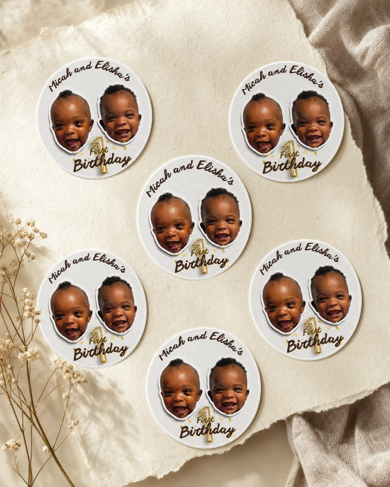 First birthday sticker set styled on a linen flat lay